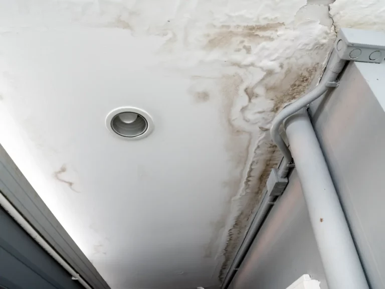 A close up of a celing with water damage.